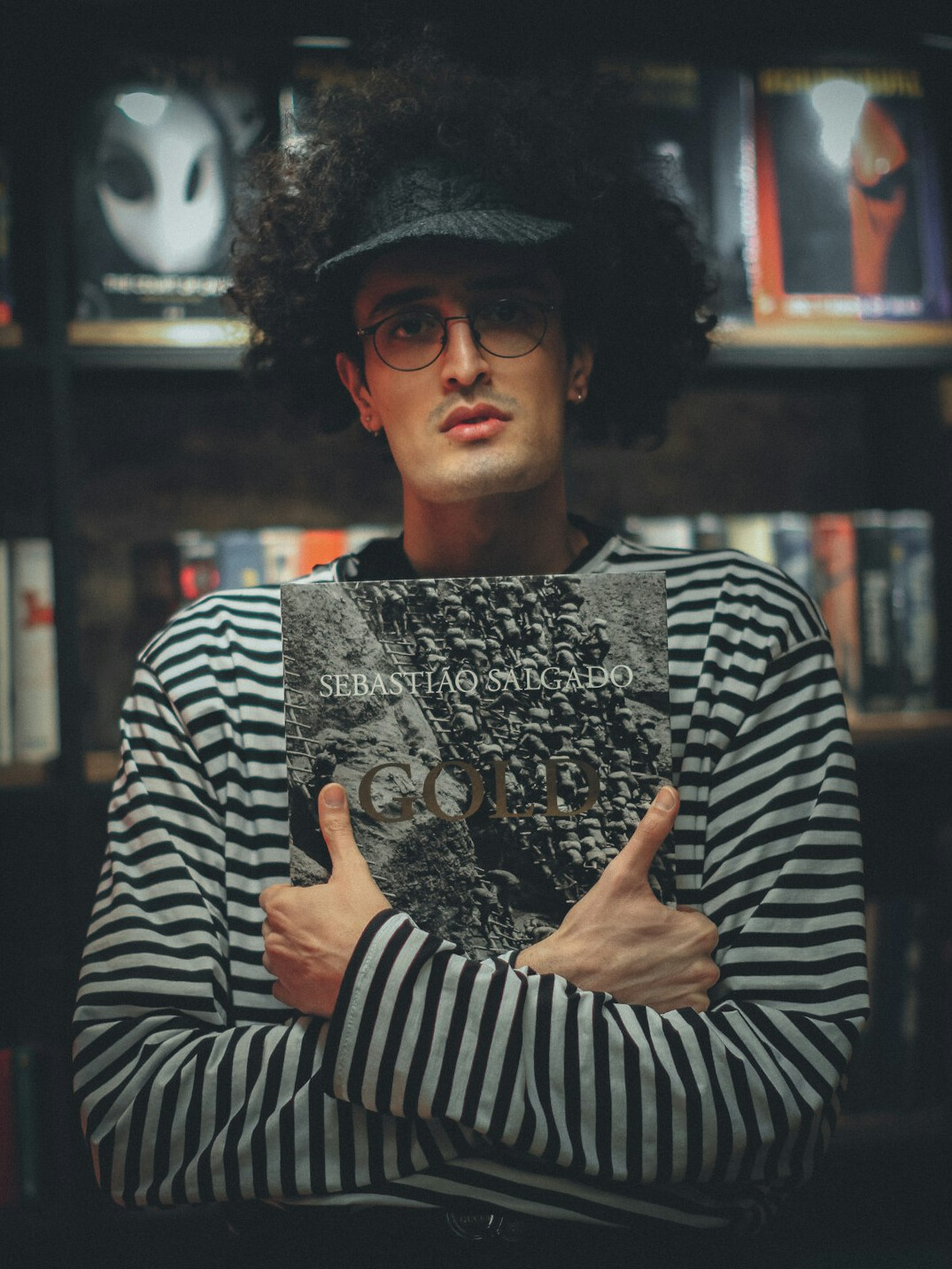 young author holding book