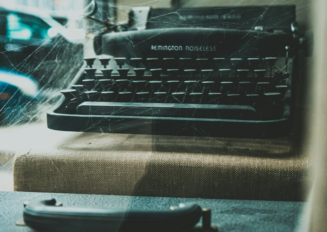 mysterious writer at typewriter